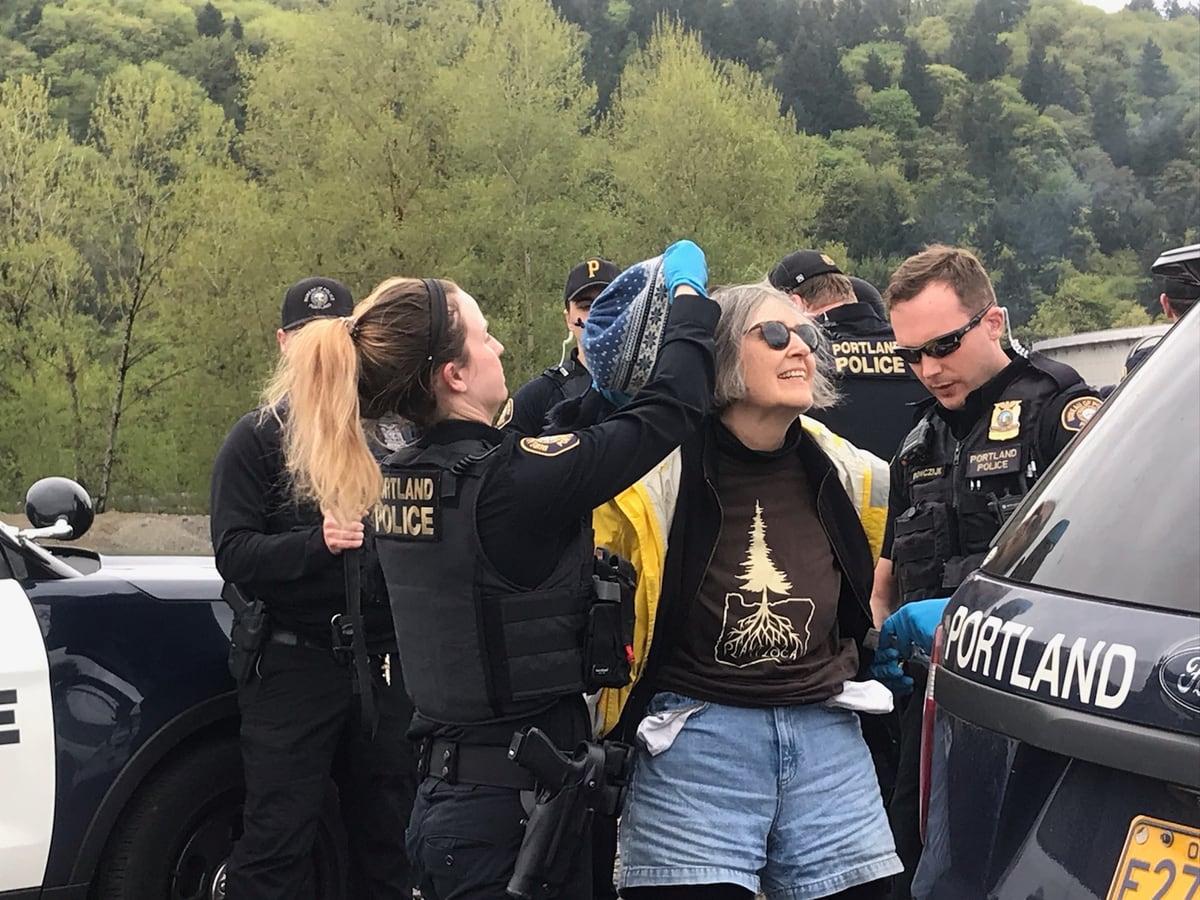 Portland Police Arrest Protesters Blocking Oil Train Tracks With A Garden The Benicia